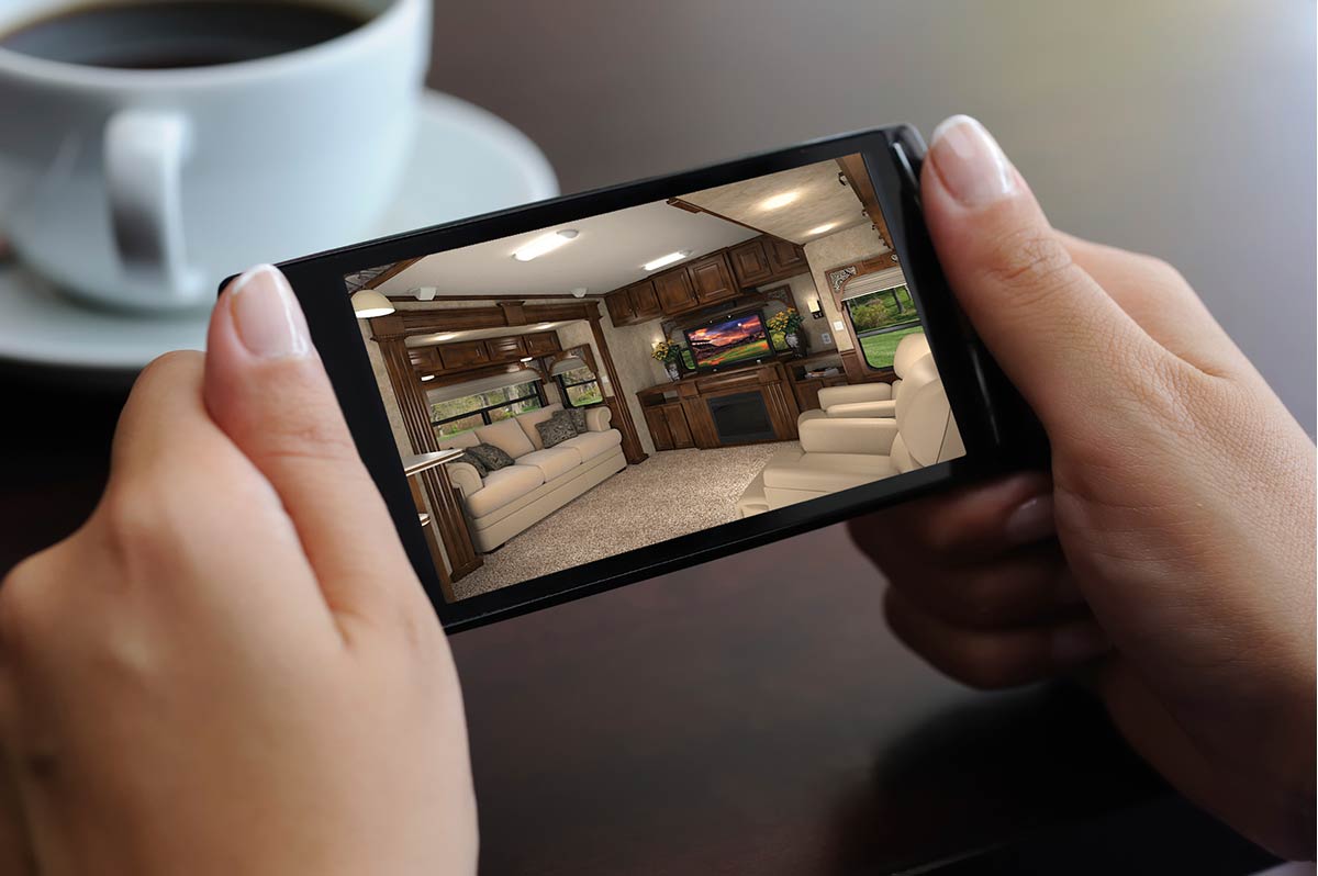 Client reviewing 3D rendering of a home interior on a smart phone.